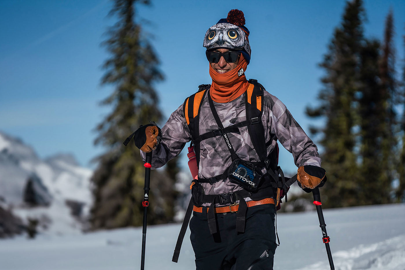 Male Splitboarder wearing the Summit Base Layer