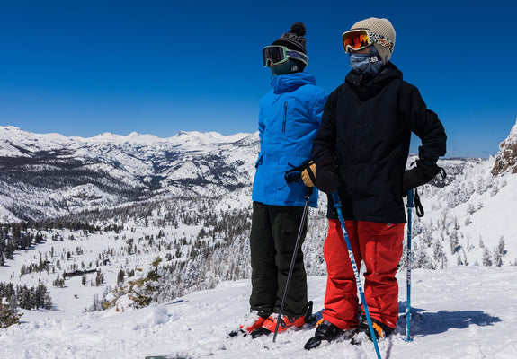 two young kids dressed for skiing