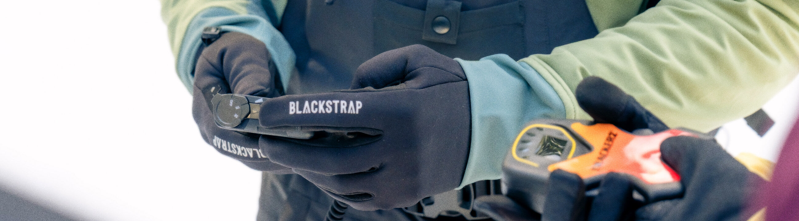 Glove liners keeping their hands warm as they get on the correct walkie talky channel.